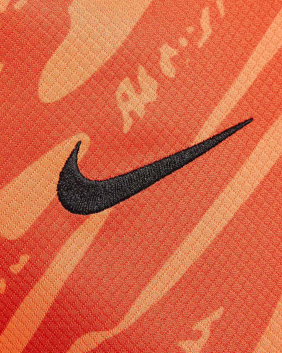 Nike total orange shirt best sale